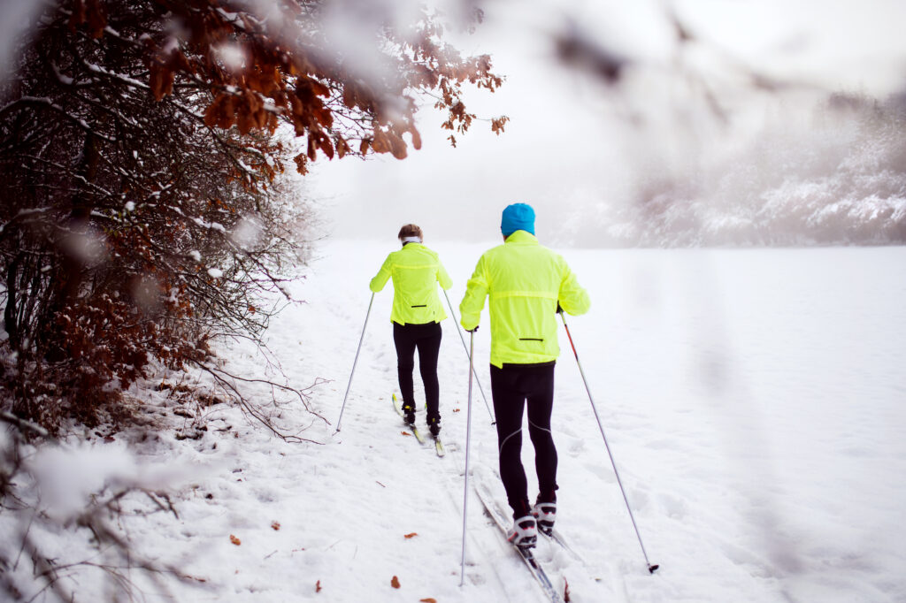 Couple cross-country skiing.