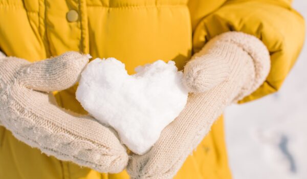 Young girl in mittens